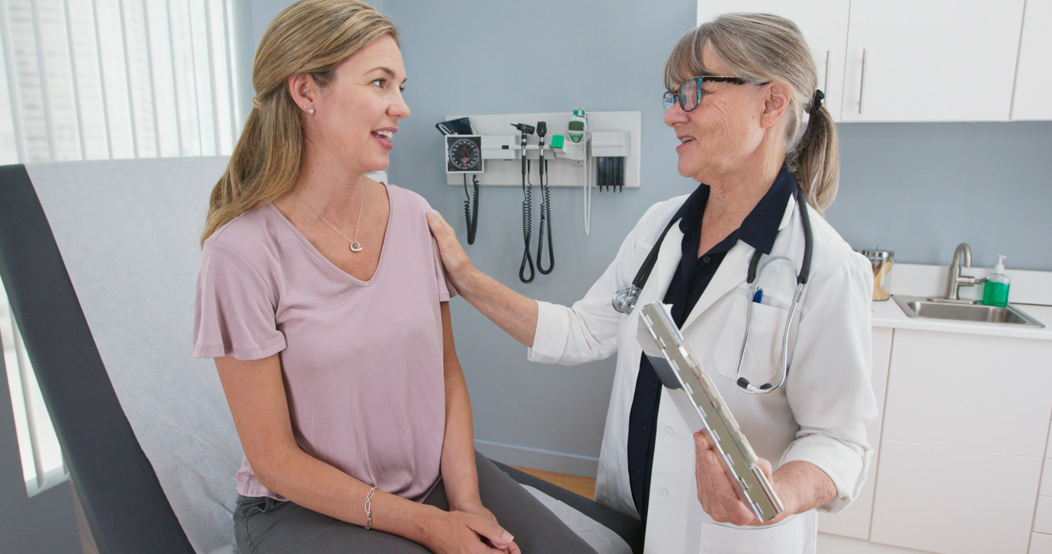 female ENT doctor doing a checkup appointment