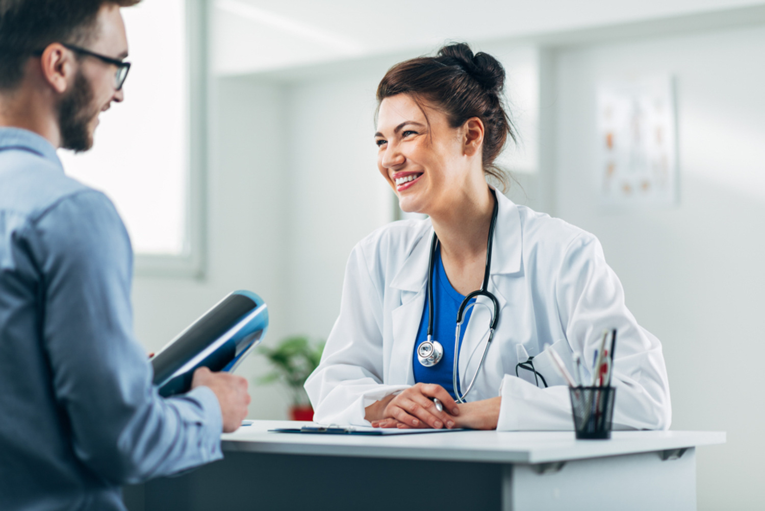 primary doctor explaining condition to patient
