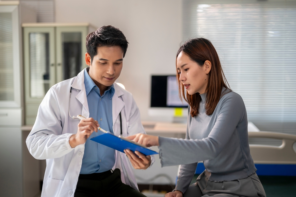 Doctor and patient consult