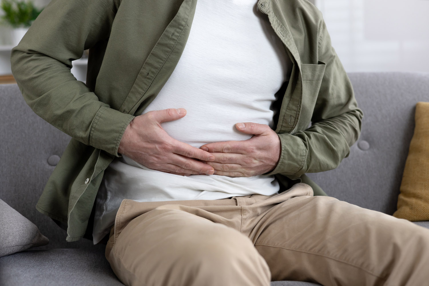 person holding stomach