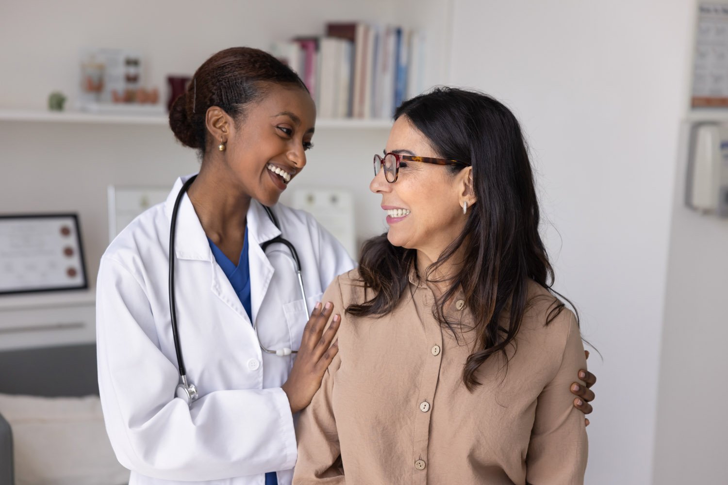 doctor reassuring patient during consultation