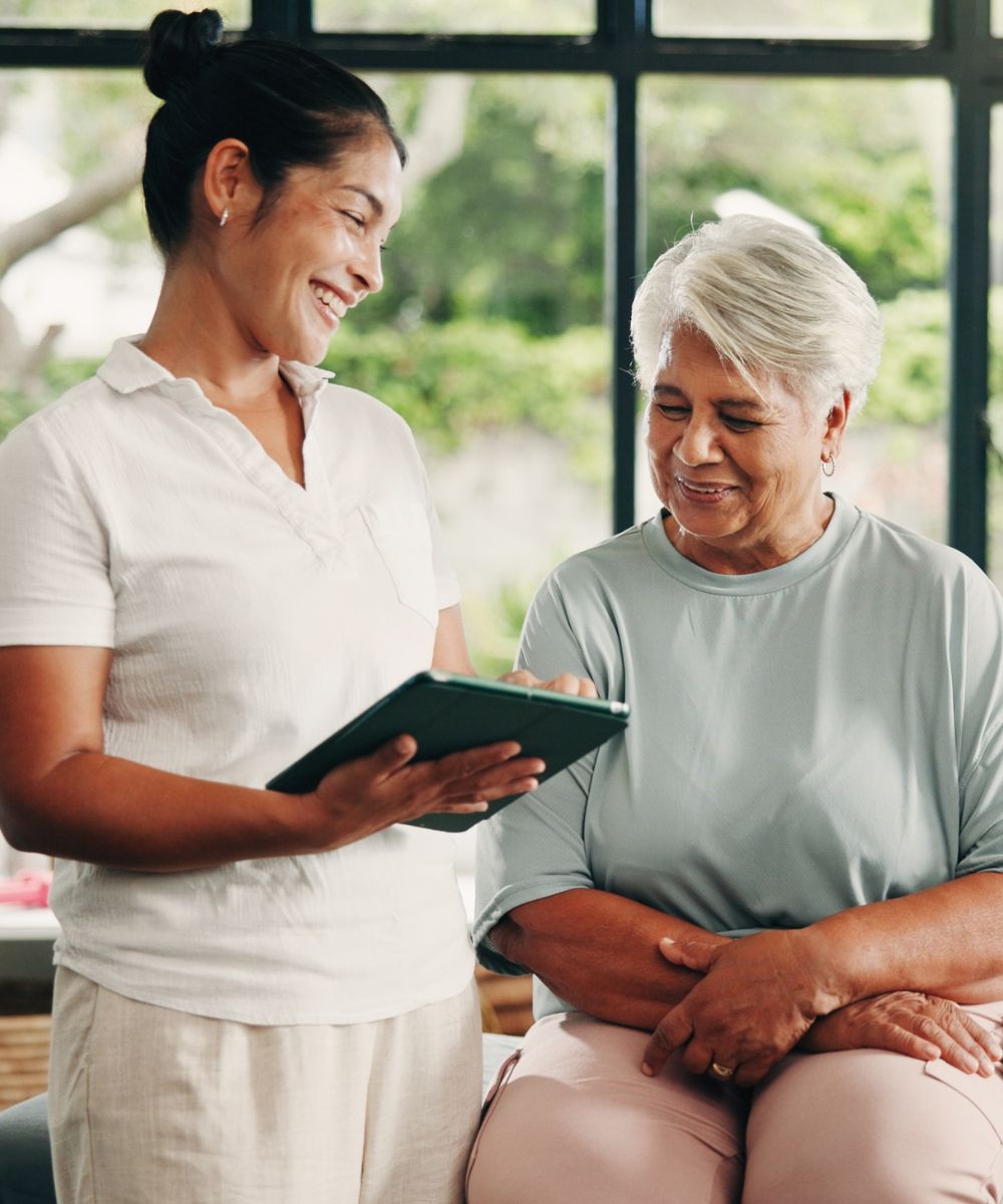 Female Doctor Diagnosing Female Patient