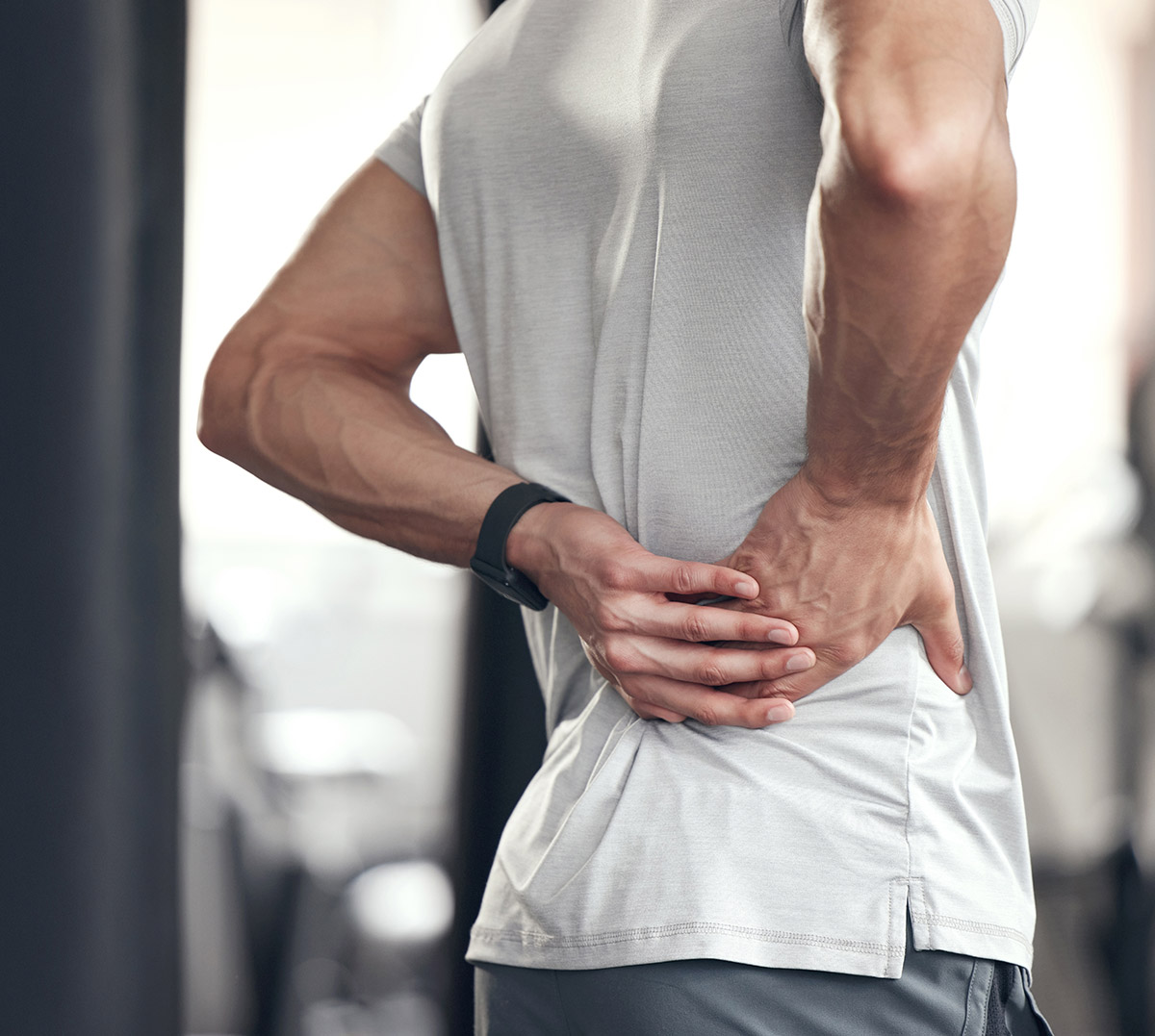 Young Man with Lower Back Pain