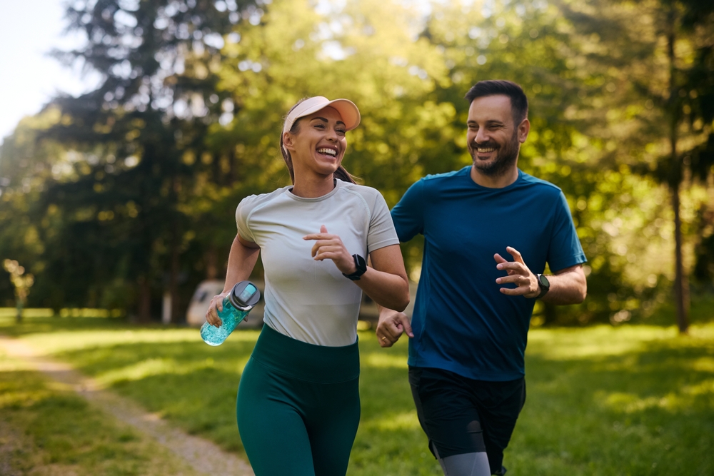 Healthy middle-aged couple jogging