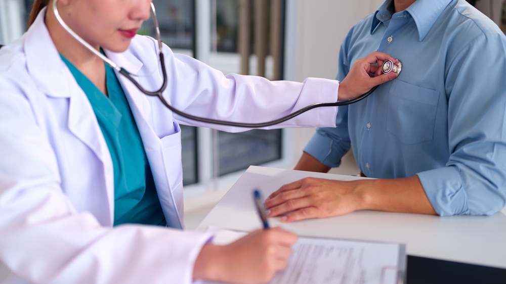 Doctor performing check-up on patient