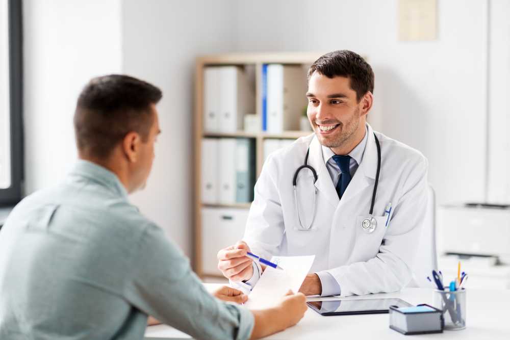 Doctor explaining medical results to patient