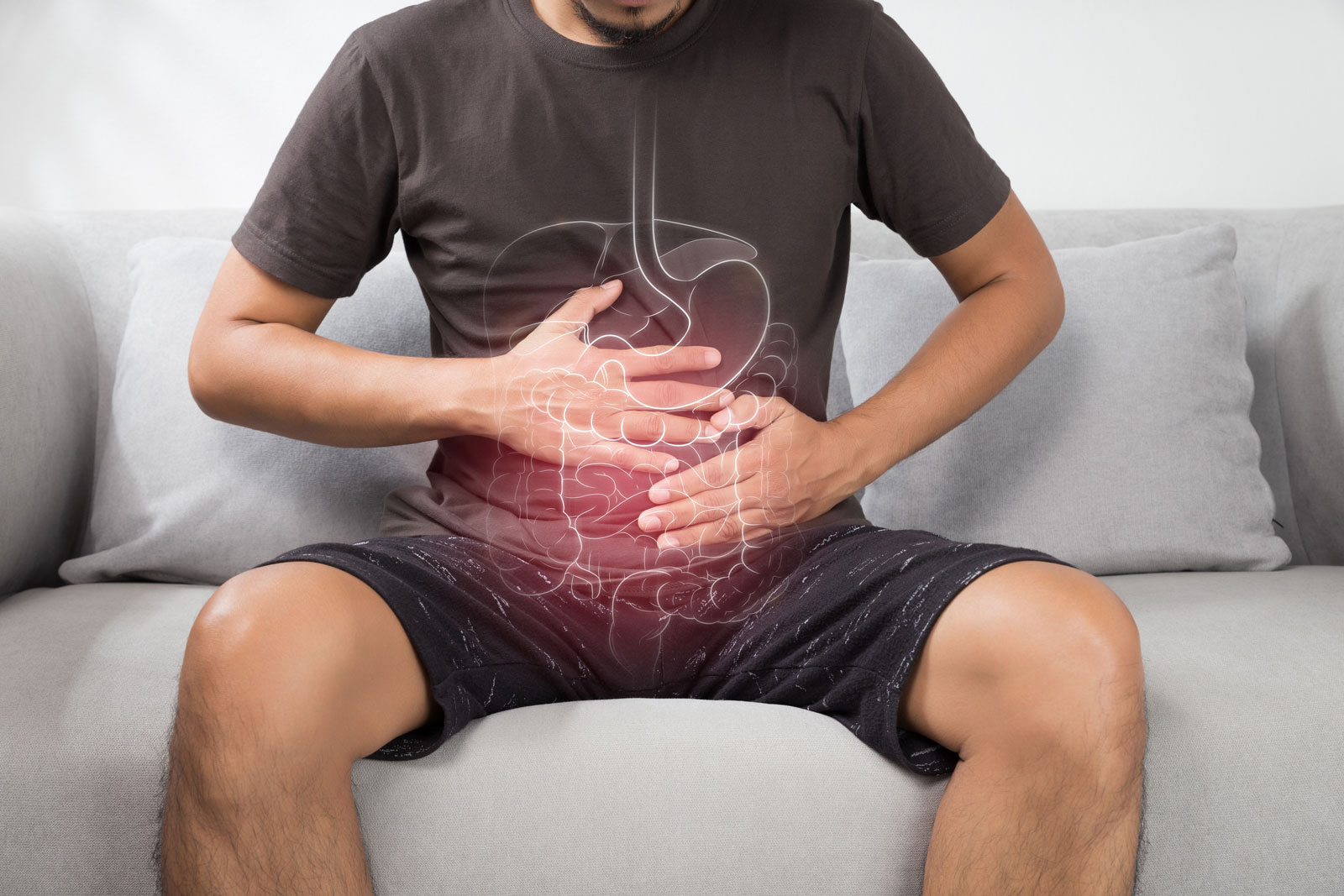 man experiencing stomach problems