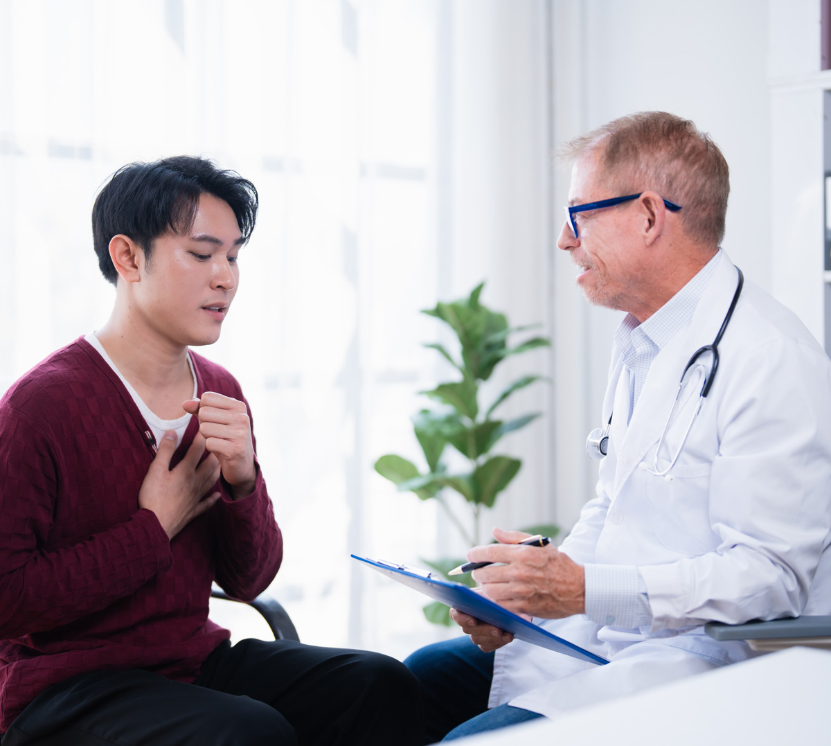 Doctor greeting a new adult patient with a handshake — Townsen Physician Group, Houston
