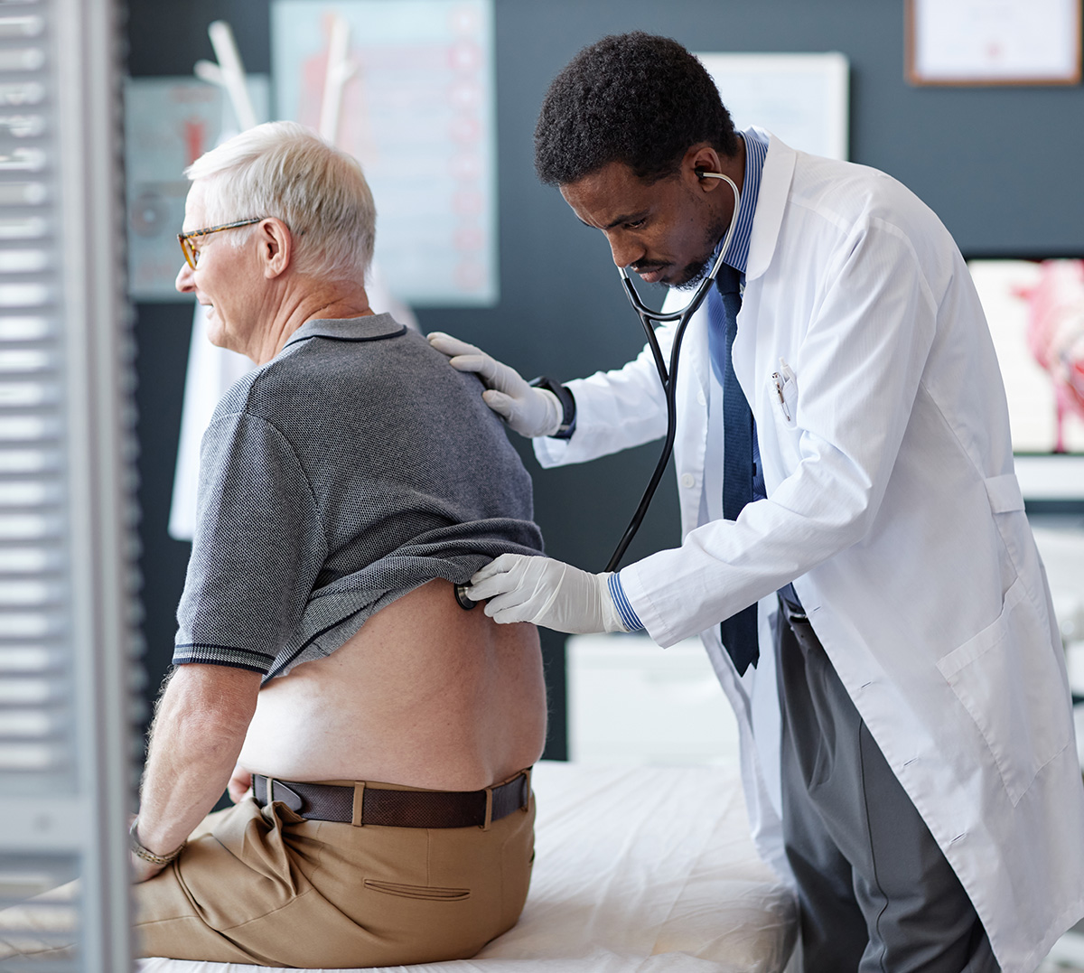doctor discussing symptoms with patient