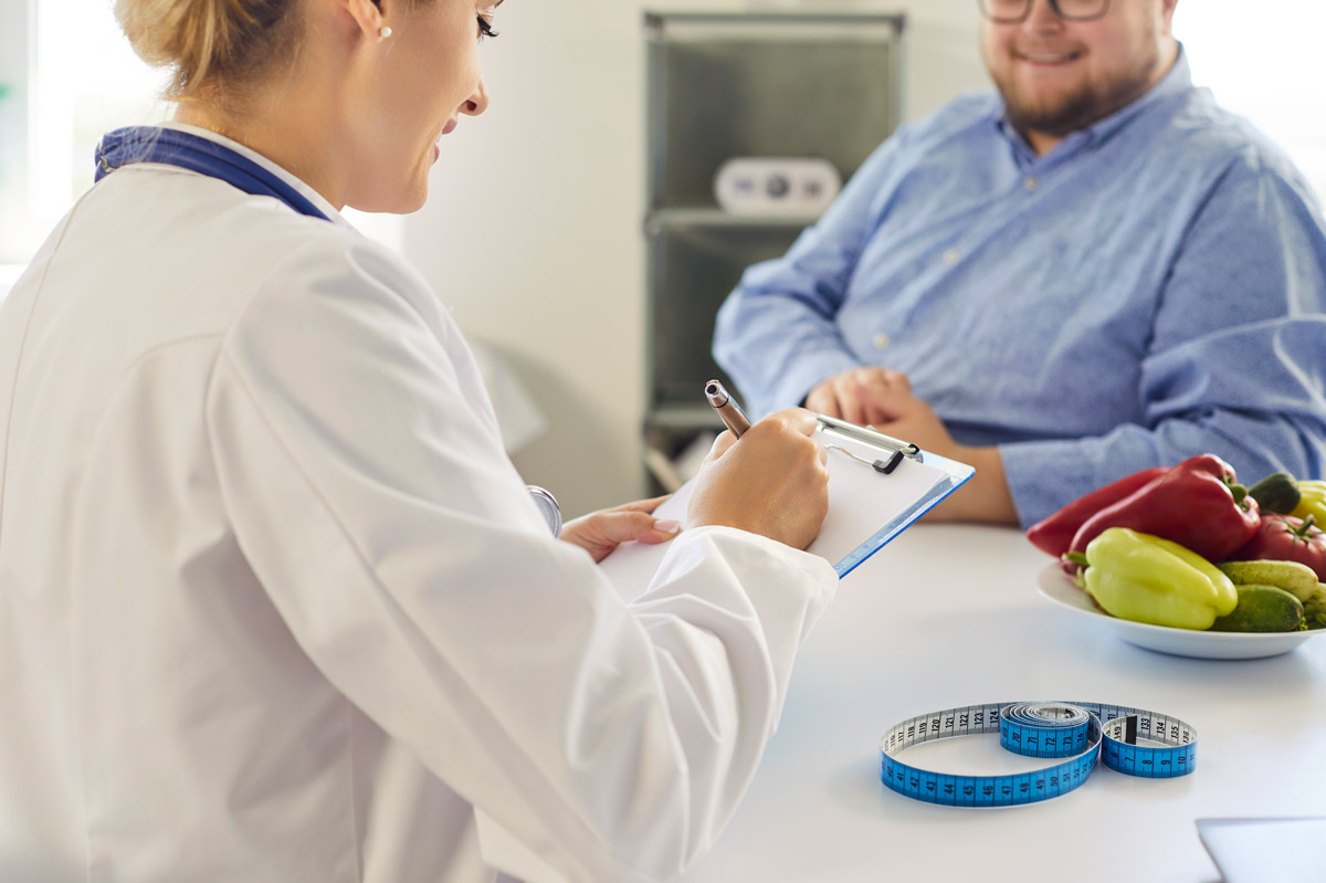 Female doctor reviewing patient records at Townsen Physician Group in Houston
