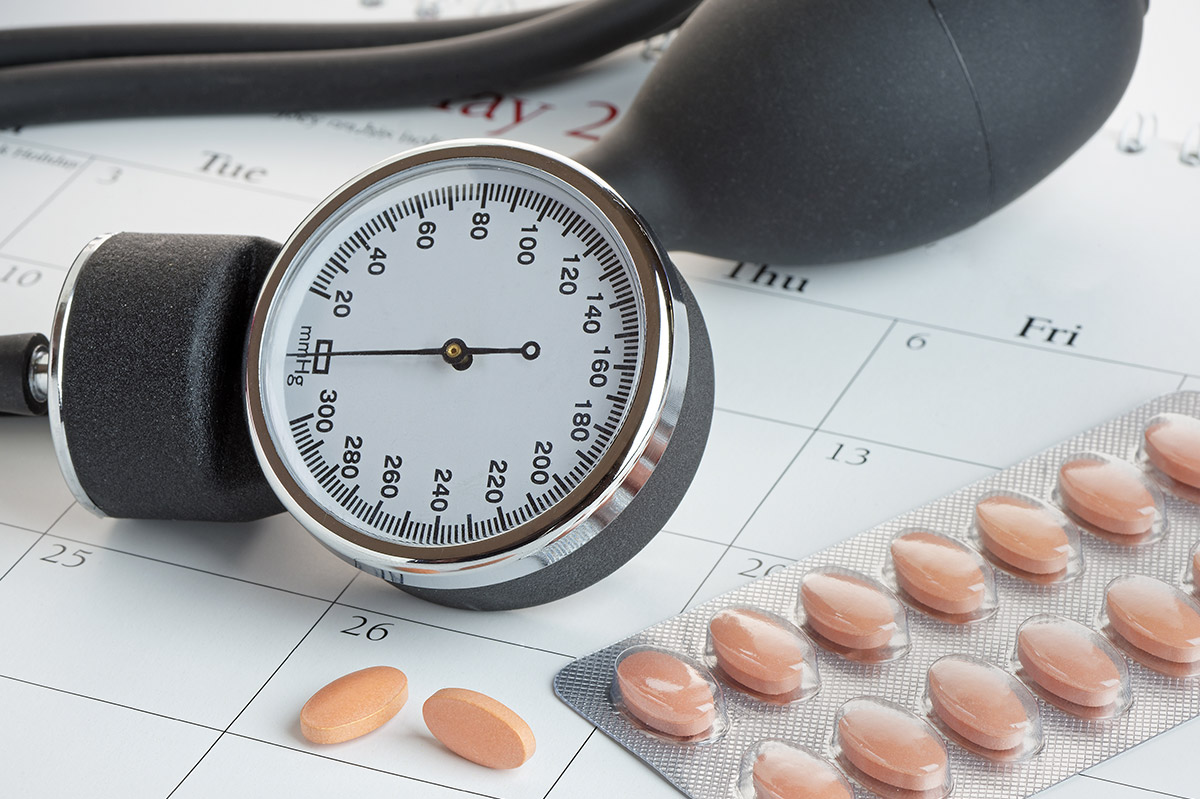 Provider reviewing statin medication options with a patient — cholesterol management at Townsen Physician Group, Houston