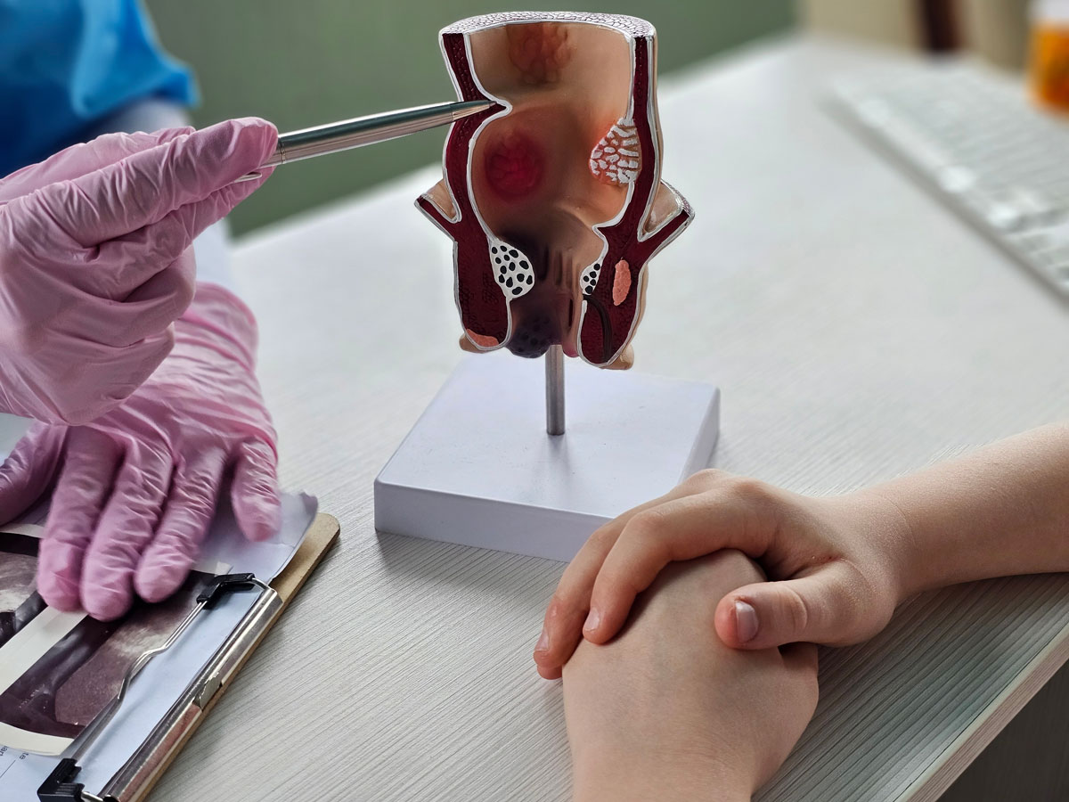 female nurse listening to elderly woman's heartbeat