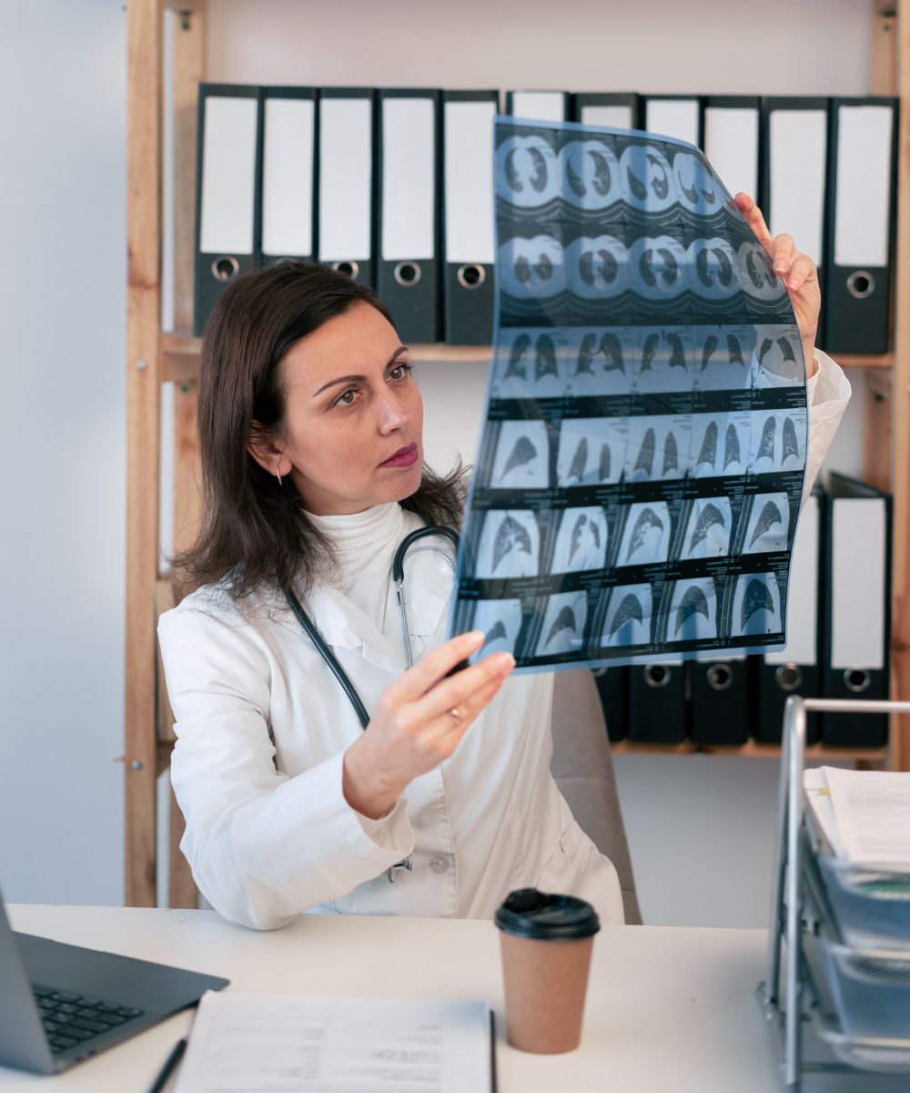 Female Doctor Checking MRI