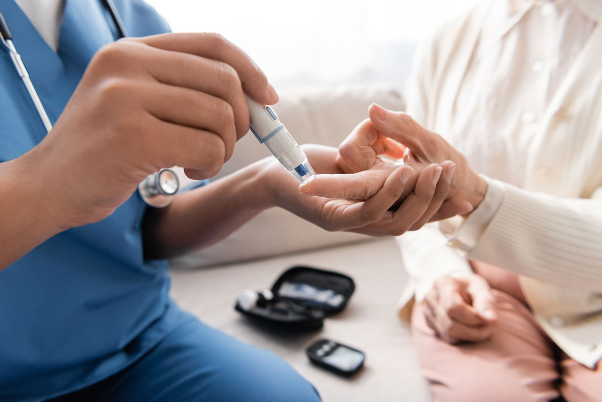 female doctor comforting woman patient