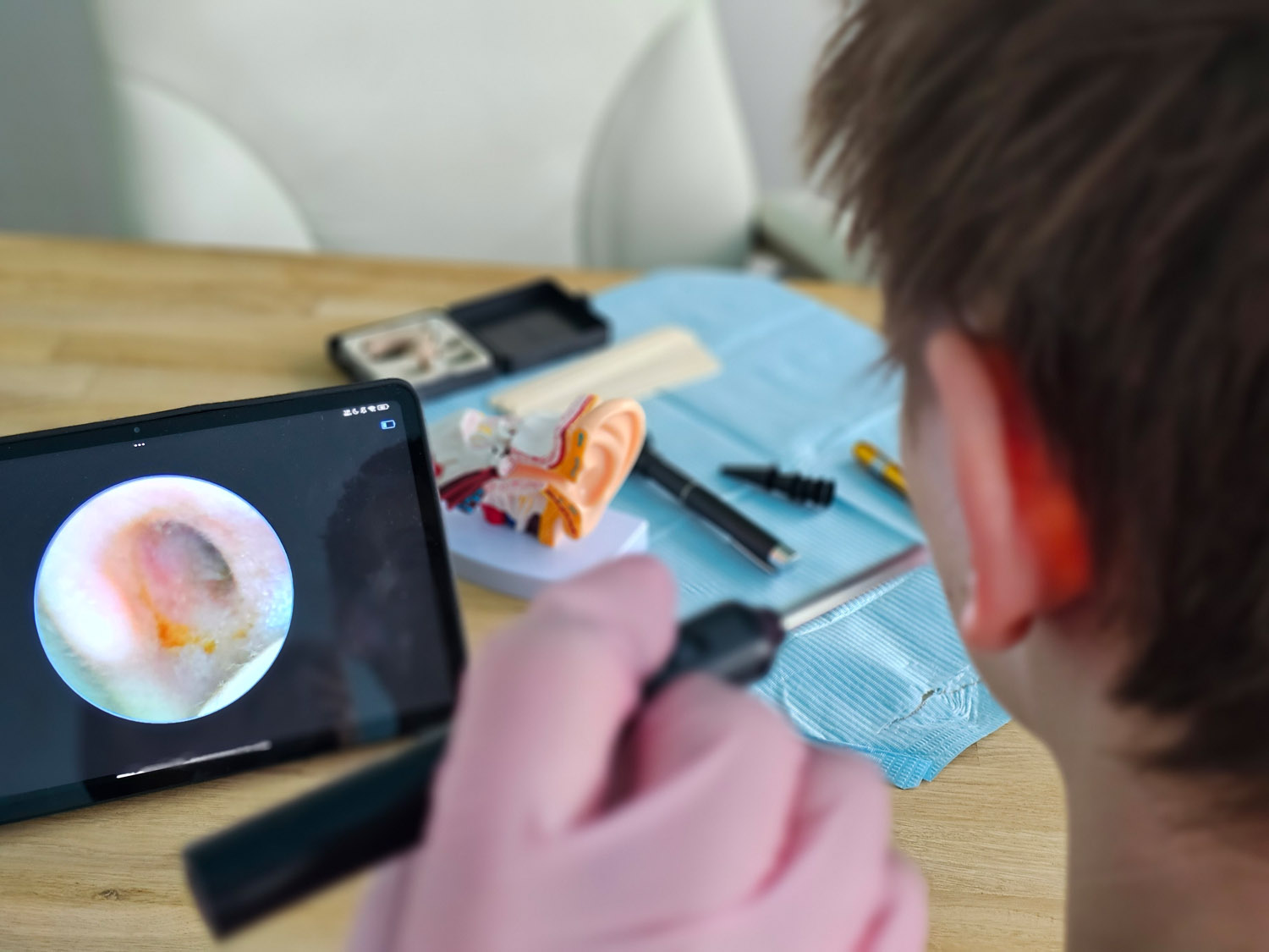 inside of ear being shown on screen using otoscope camera