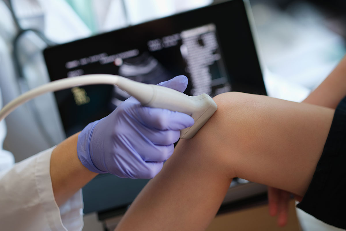female doctor comforting woman patient