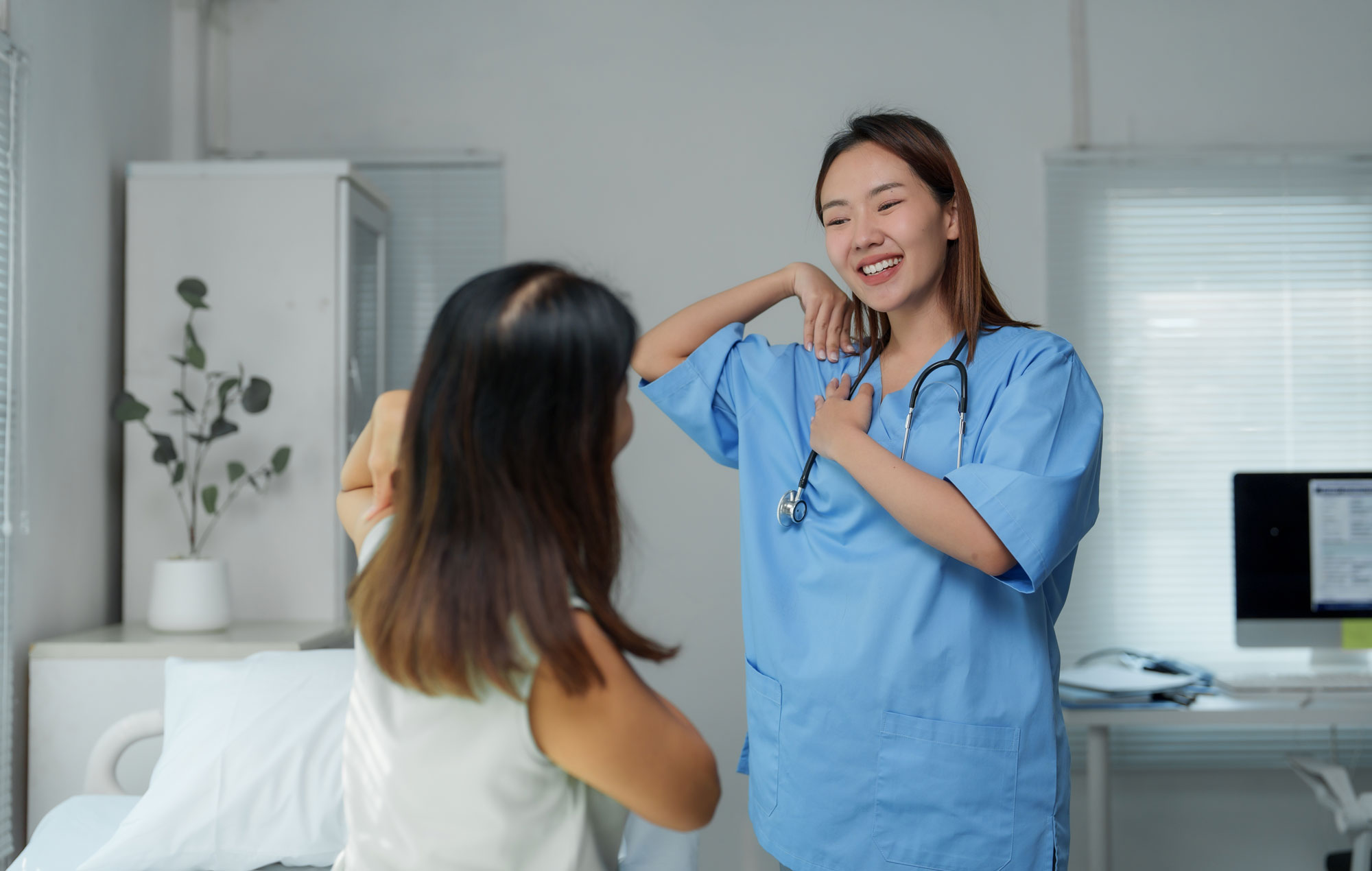 doctor helping patient with pain management