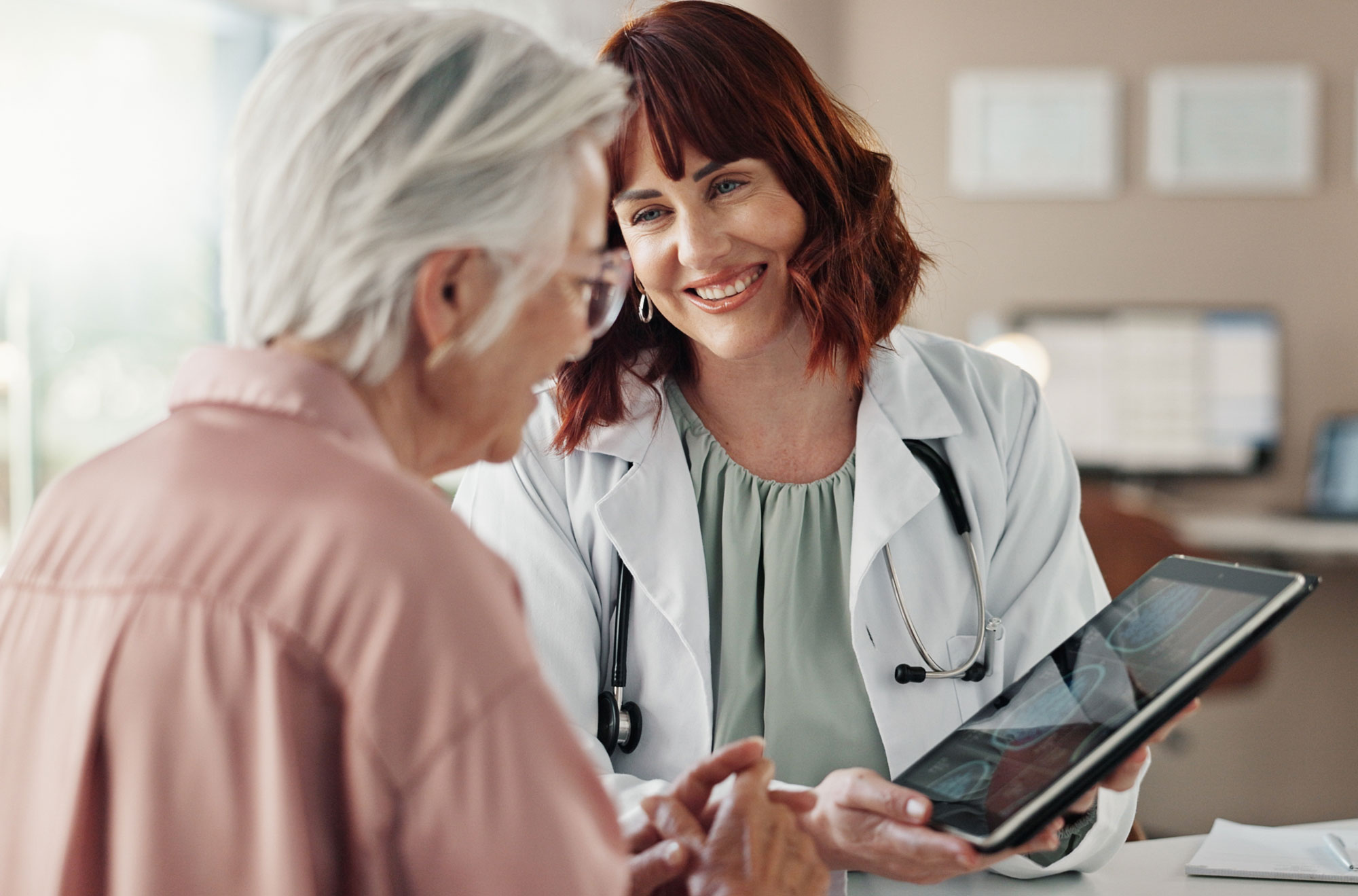 elderly woman getting diagnosis