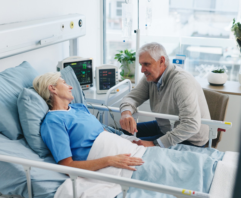 Sick Woman Confined in Bed with Husband