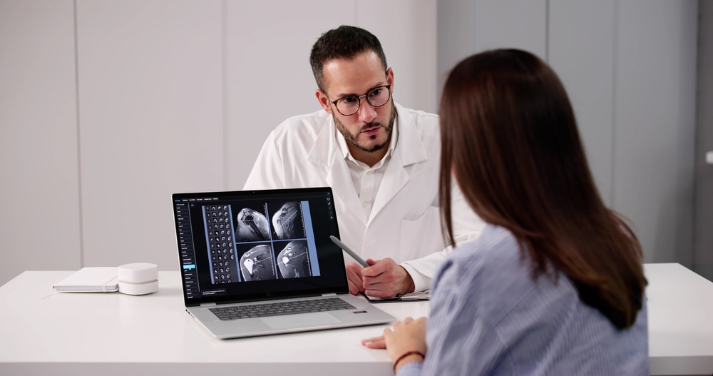 Doctor showing shoulder xray