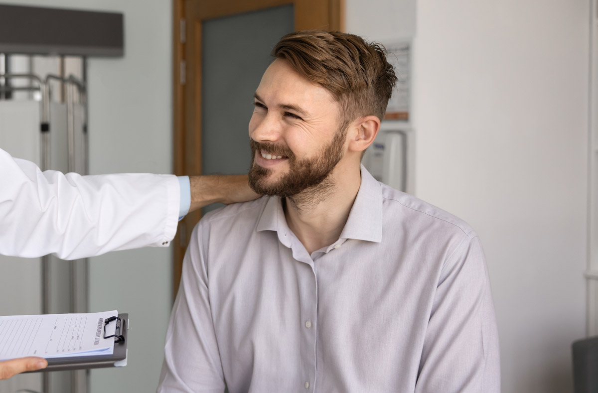 New patient talking with a primary care physician at Townsen Physician Group in Houston