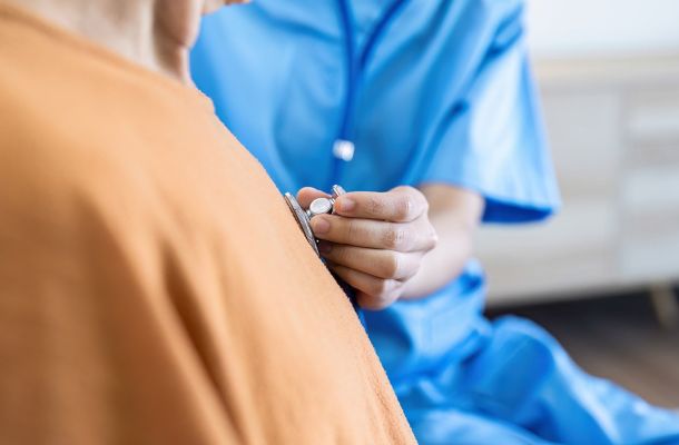 Physician listening to a patient’s heart at Townsen Physician Group in Houston
