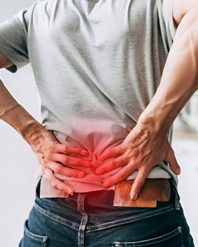man experiencing back pain